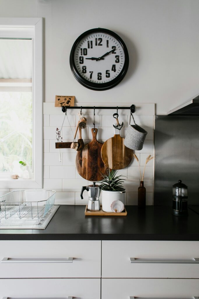 Hanging pots and pans in small kitchen