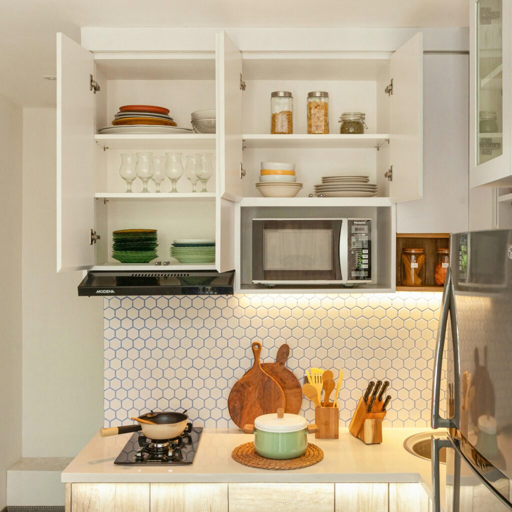 Shelf risers inside kitchen cabinets