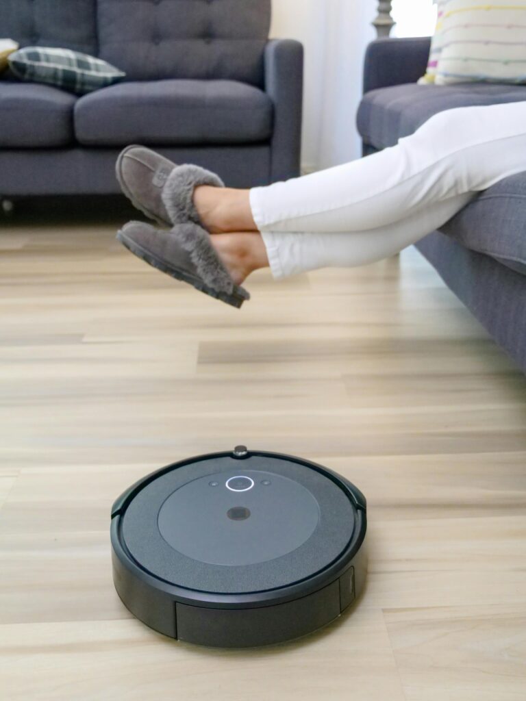 Robot vacuum cleaning modern apartment