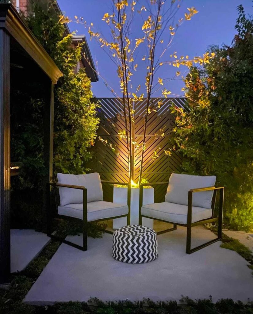 Small patio decorated with budget string lights in evening